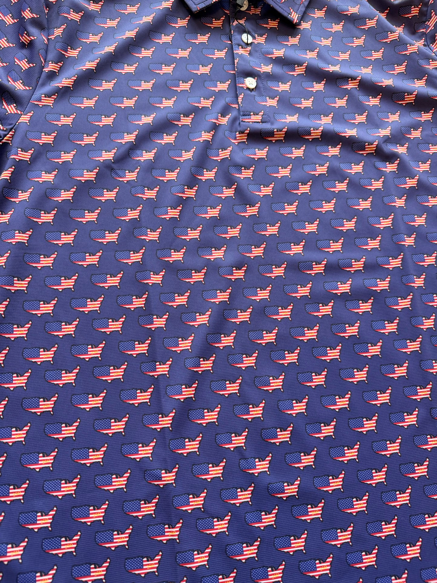 Close-up of American flag pattern on JD Buck USA 250th Anniversary polo