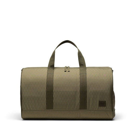 Herschel Novel Duffle in Ivy Green Diamond by Herschel Supply Co.